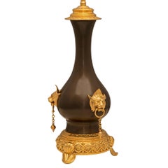 Pair of French 19th Century Renaissance St. Patinated Bronze and Ormolu Lamps