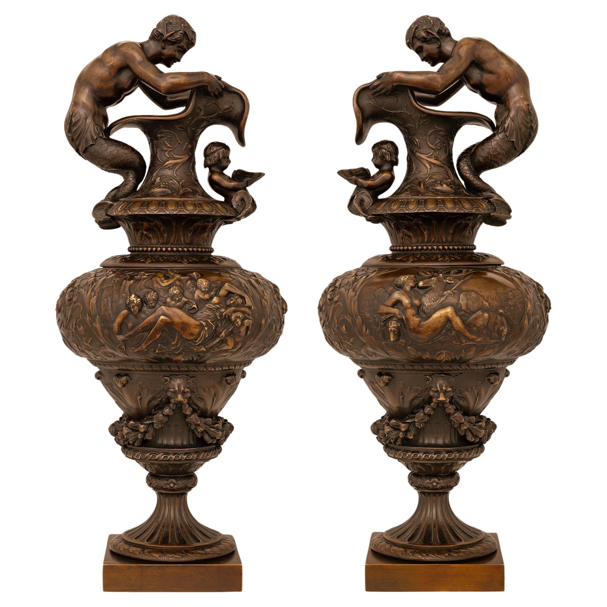 pair of French 19th century Renaissance st. patinated Bronze ewers/urns For Sale