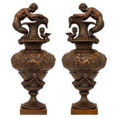 pair of French 19th century Renaissance st. patinated Bronze ewers/urns