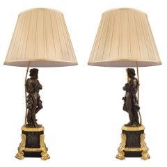 Pair of French 19th Century Renaissance Style Patinated Bronze and Ormolu Lamps