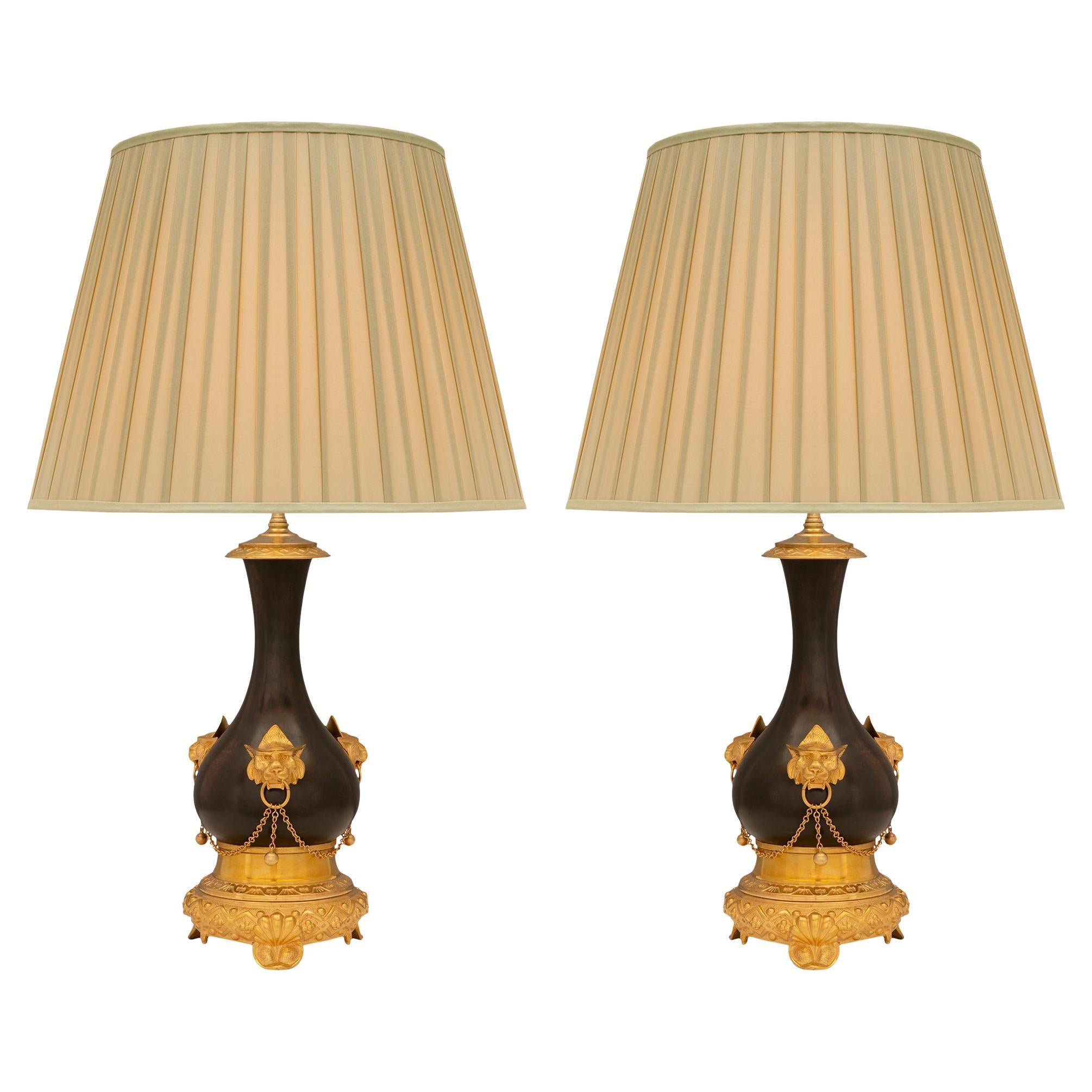 Pair of French 19th Century Renaissance Style Patinated Bronze and Ormolu Lamps For Sale