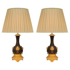 Antique Pair of French 19th Century Renaissance Style Patinated Bronze and Ormolu Lamps