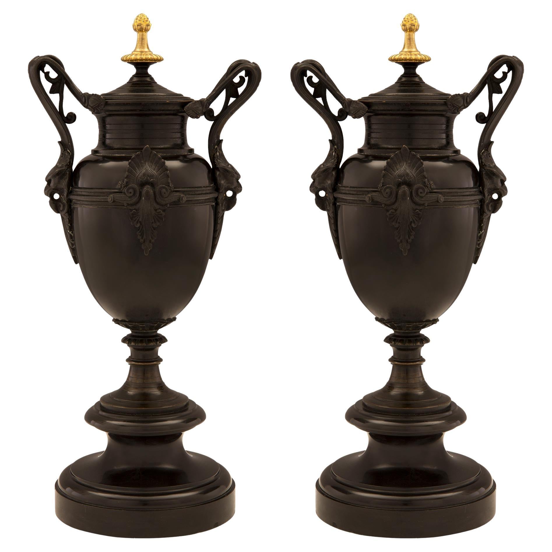 Pair of French 19th Century Renaissance Style Patinated Bronze and Ormolu Urns For Sale