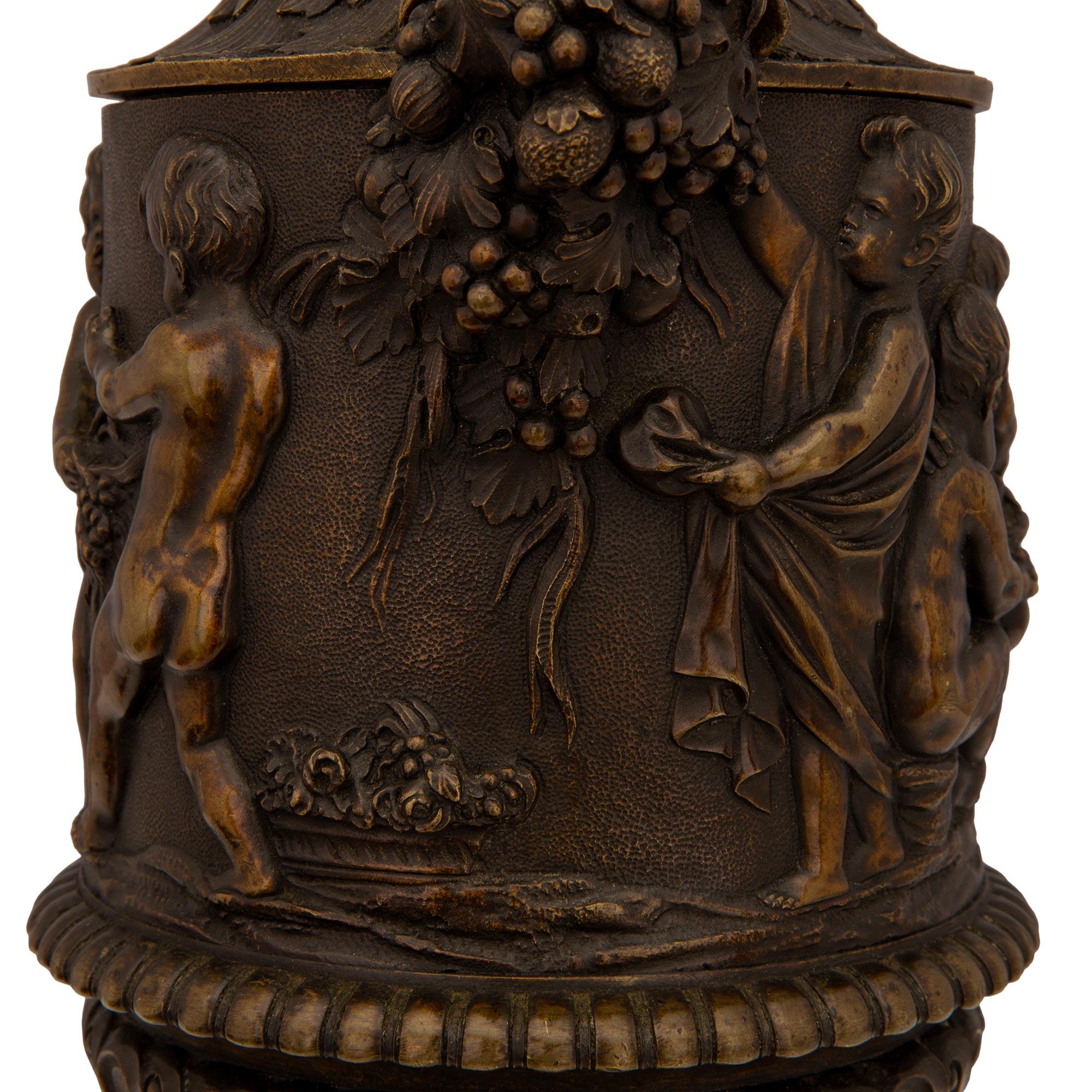 Pair of French 19th Century Renaissance Style Patinated Bronze Lidded Urns For Sale 8