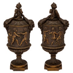 Pair of French 19th Century Renaissance Style Patinated Bronze Lidded Urns