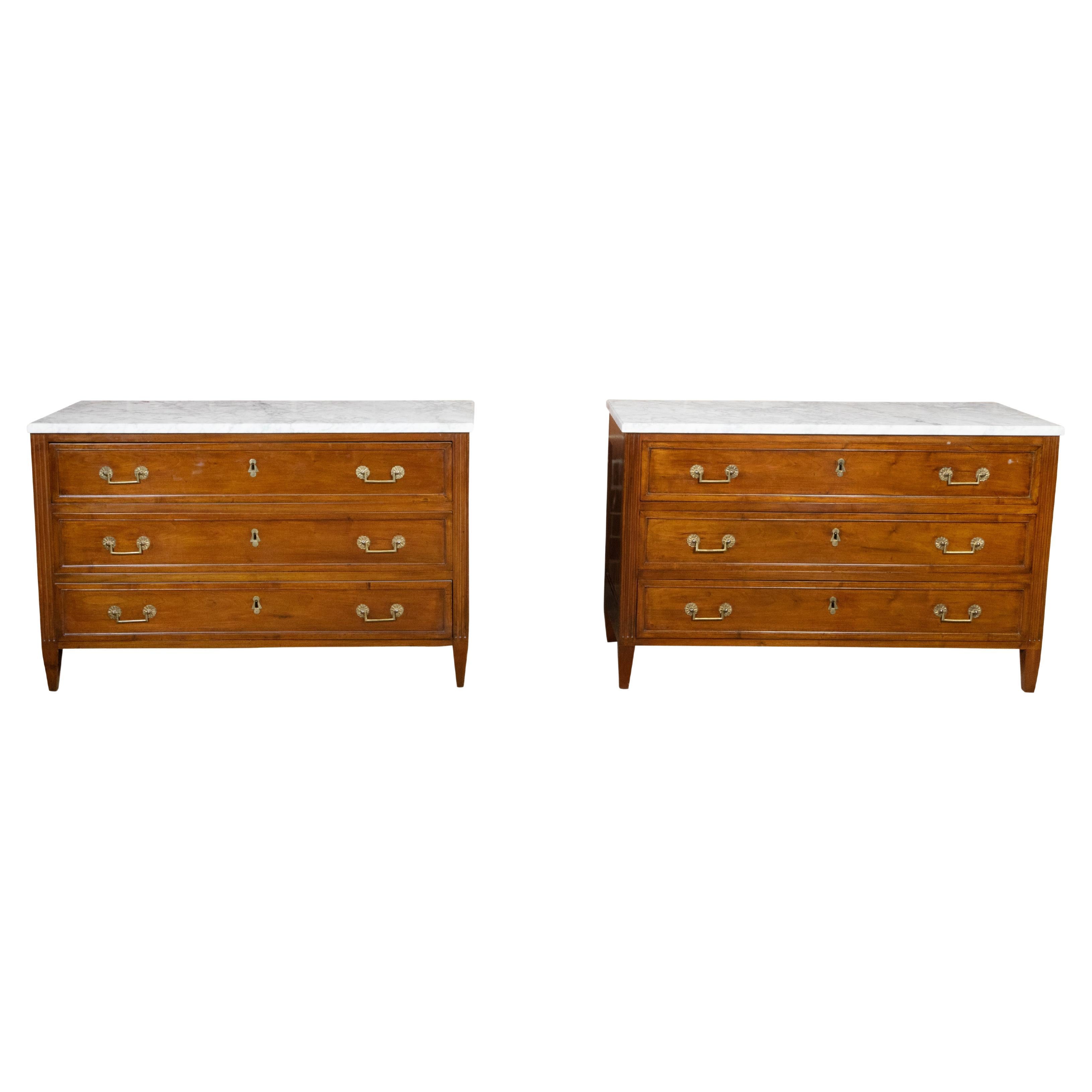 Pair of French 19th Century Three-Drawer Walnut Commodes with White Marble Tops For Sale