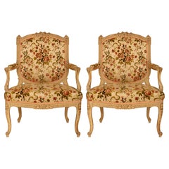 pair of French 19th century Transitional st. patinated wood armchairs