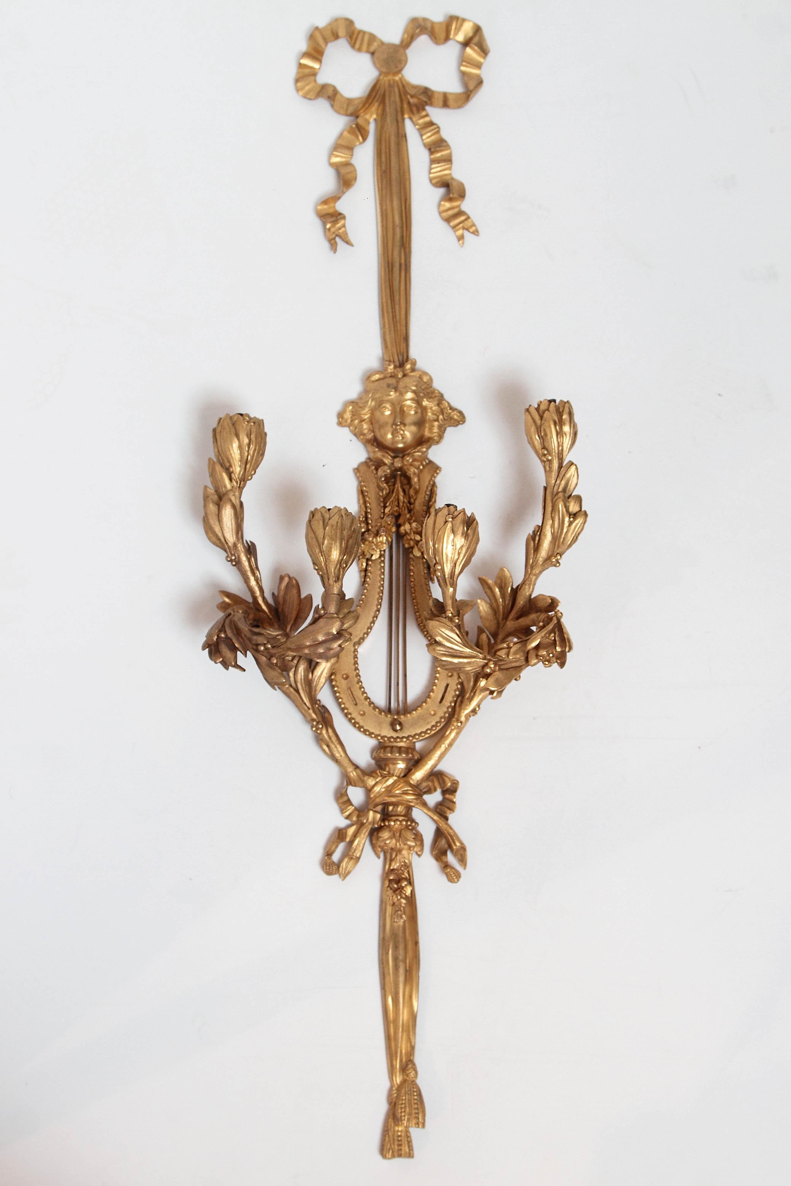 Pair of large and fine 19th century gilt bronze sconces.