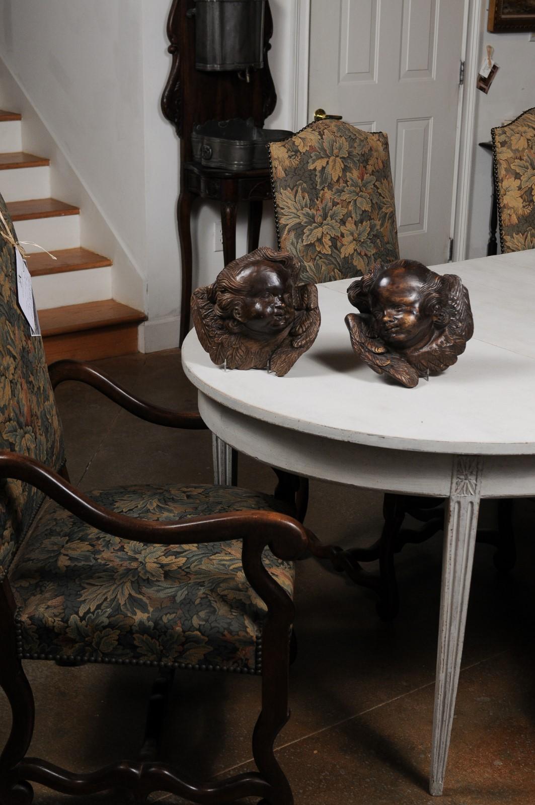 Hand-Carved Pair of French 19th Century Walnut Wall Hanging Cherub Sculptures with Patina