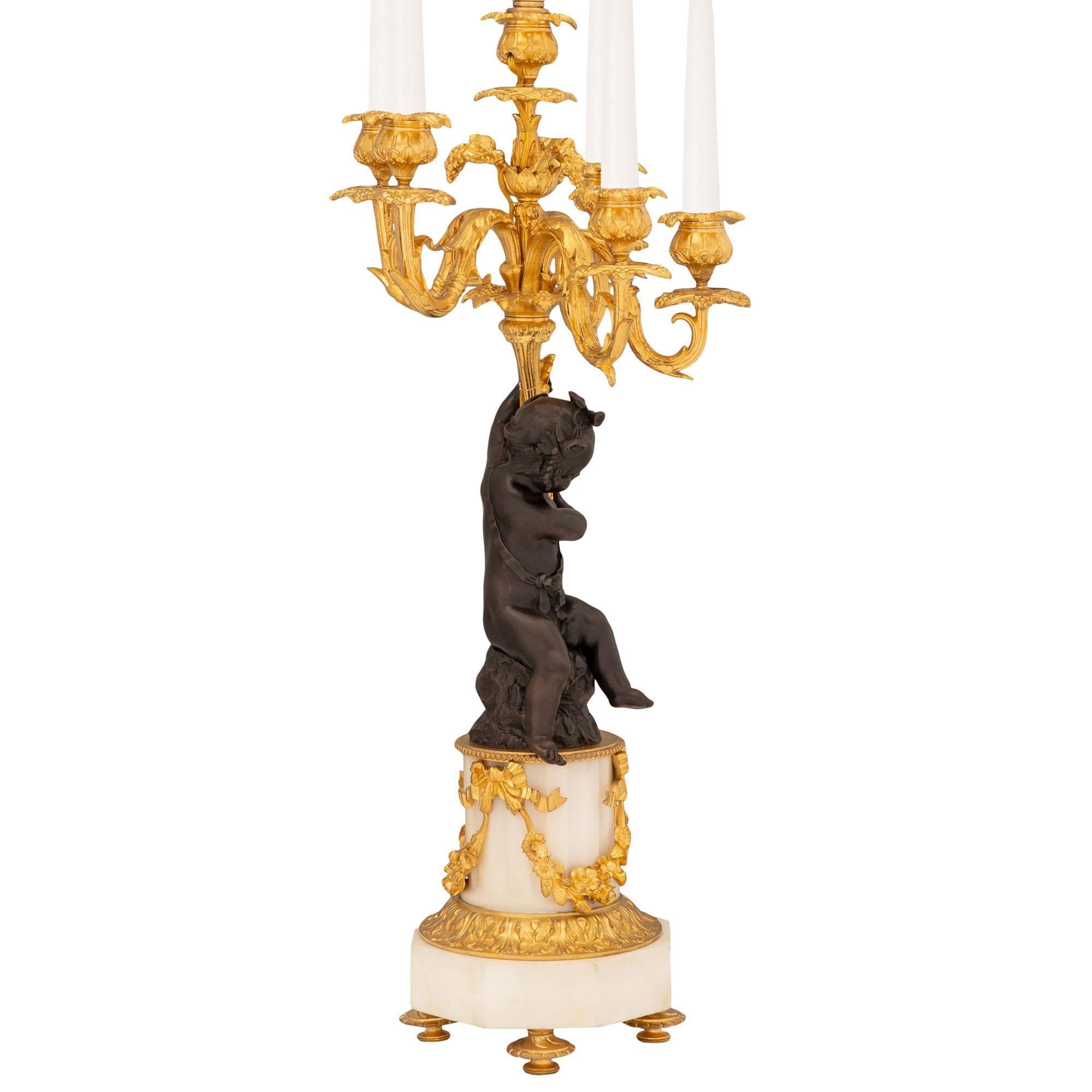 Patinated Pair of French 19th Century White Carrara Marble, Ormolu and Bronze Lamps For Sale