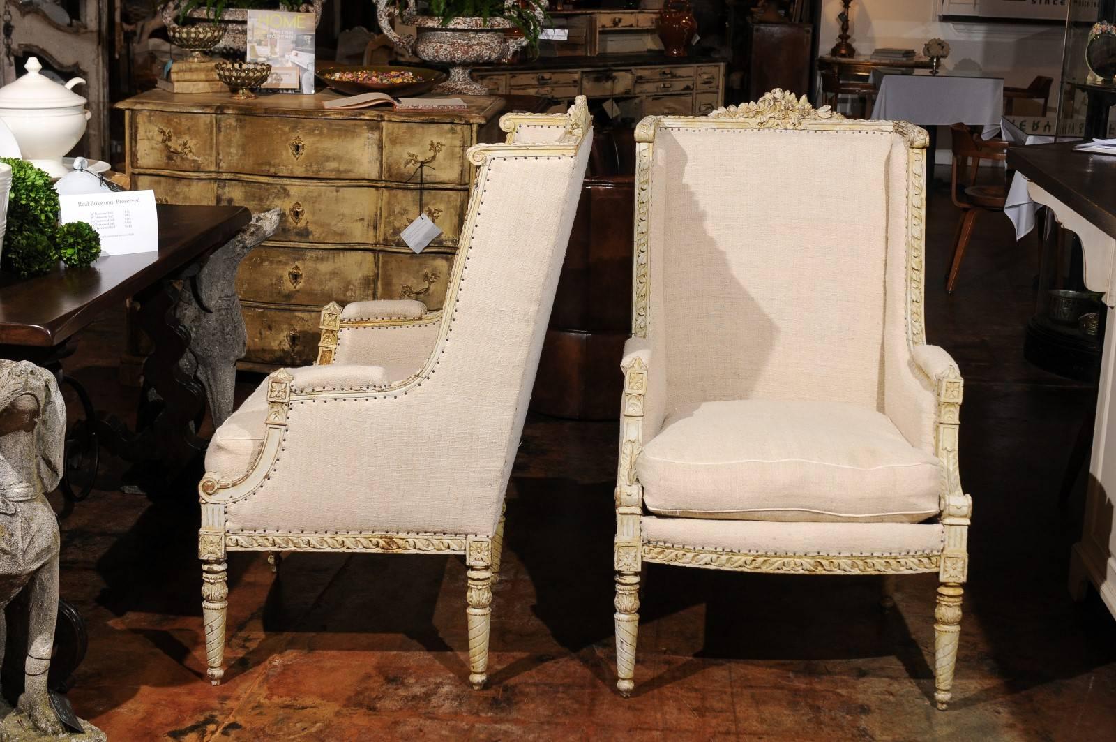 Pair of French 19th Century Wingback Bergères Chairs with Richly Carved Décor 7