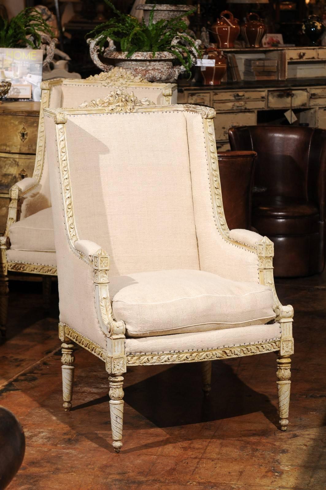 Louis XVI Pair of French 19th Century Wingback Bergères Chairs with Richly Carved Décor