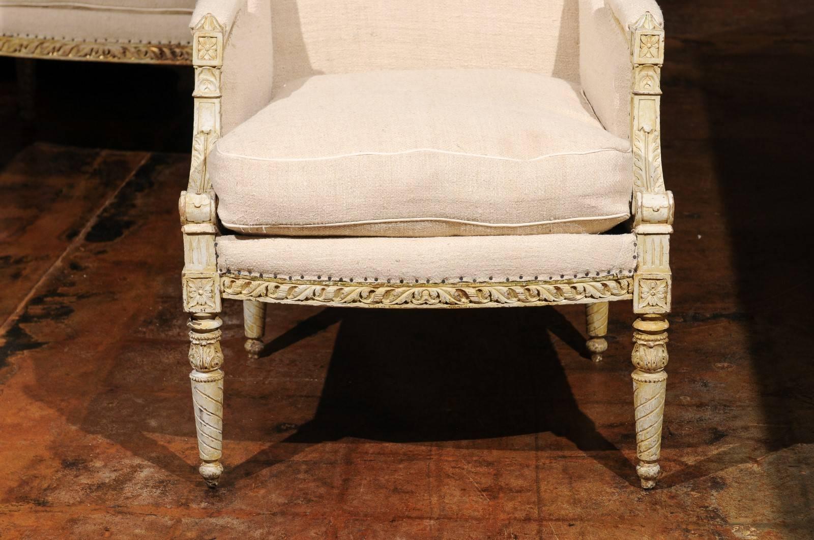 Linen Pair of French 19th Century Wingback Bergères Chairs with Richly Carved Décor