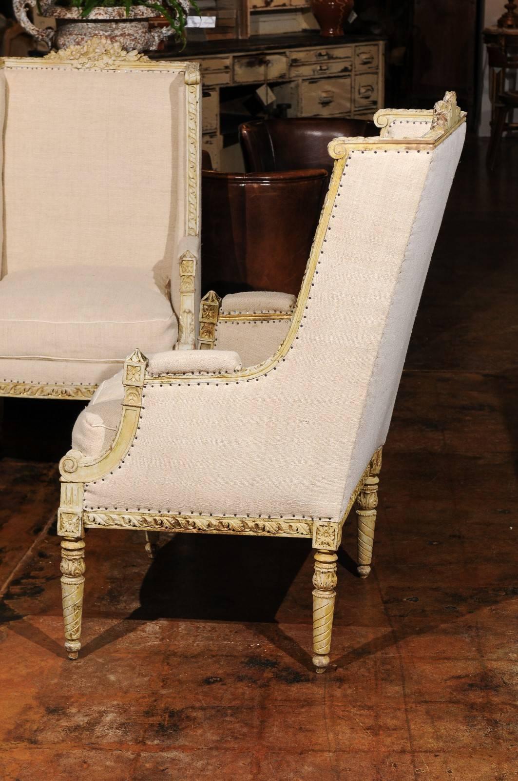 Pair of French 19th Century Wingback Bergères Chairs with Richly Carved Décor 2