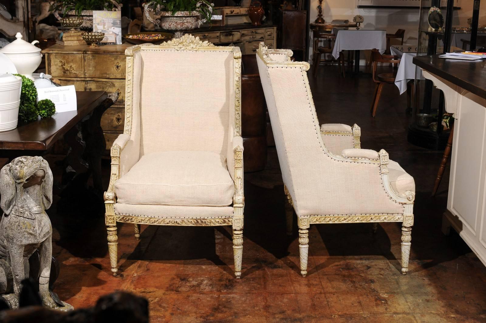 Pair of French 19th Century Wingback Bergères Chairs with Richly Carved Décor 4
