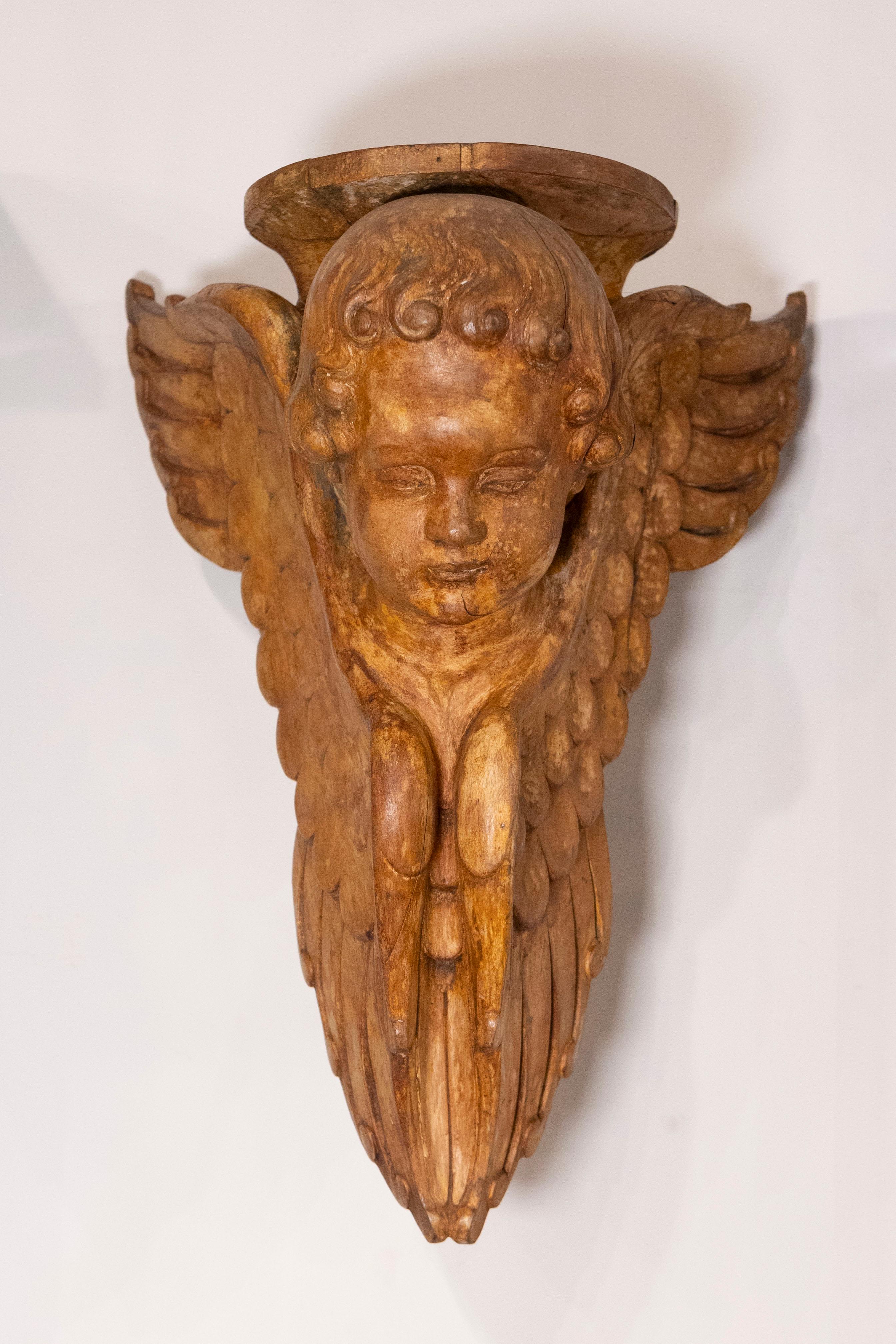 Hand-Carved Pair of French 19th Century Wooden Wall Brackets with Carved Cherubs For Sale