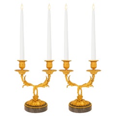 pareja de candelabros franceses del siglo xvii de mármol Bleu Turquin y Ormolu