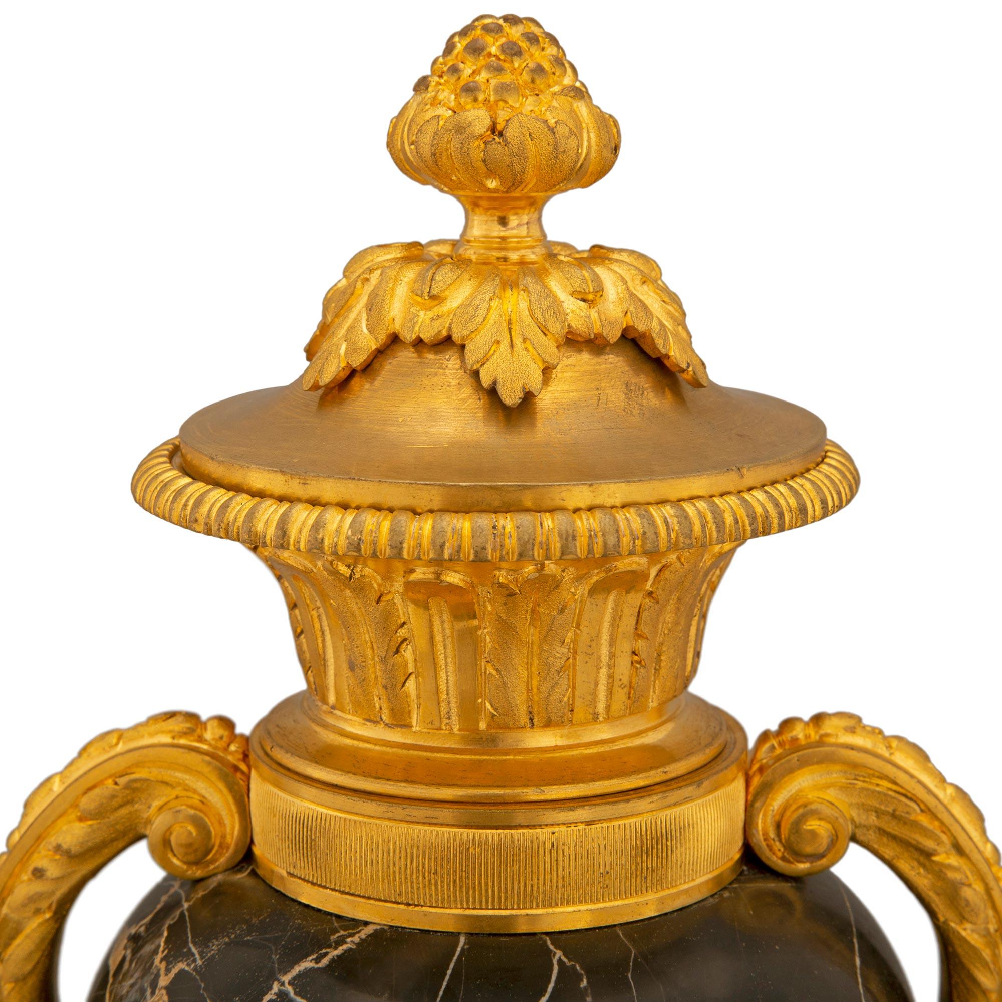 Pair of French 19th Louis XVI St. Ormolu and Portoro Marble Lidded Urns For Sale 1