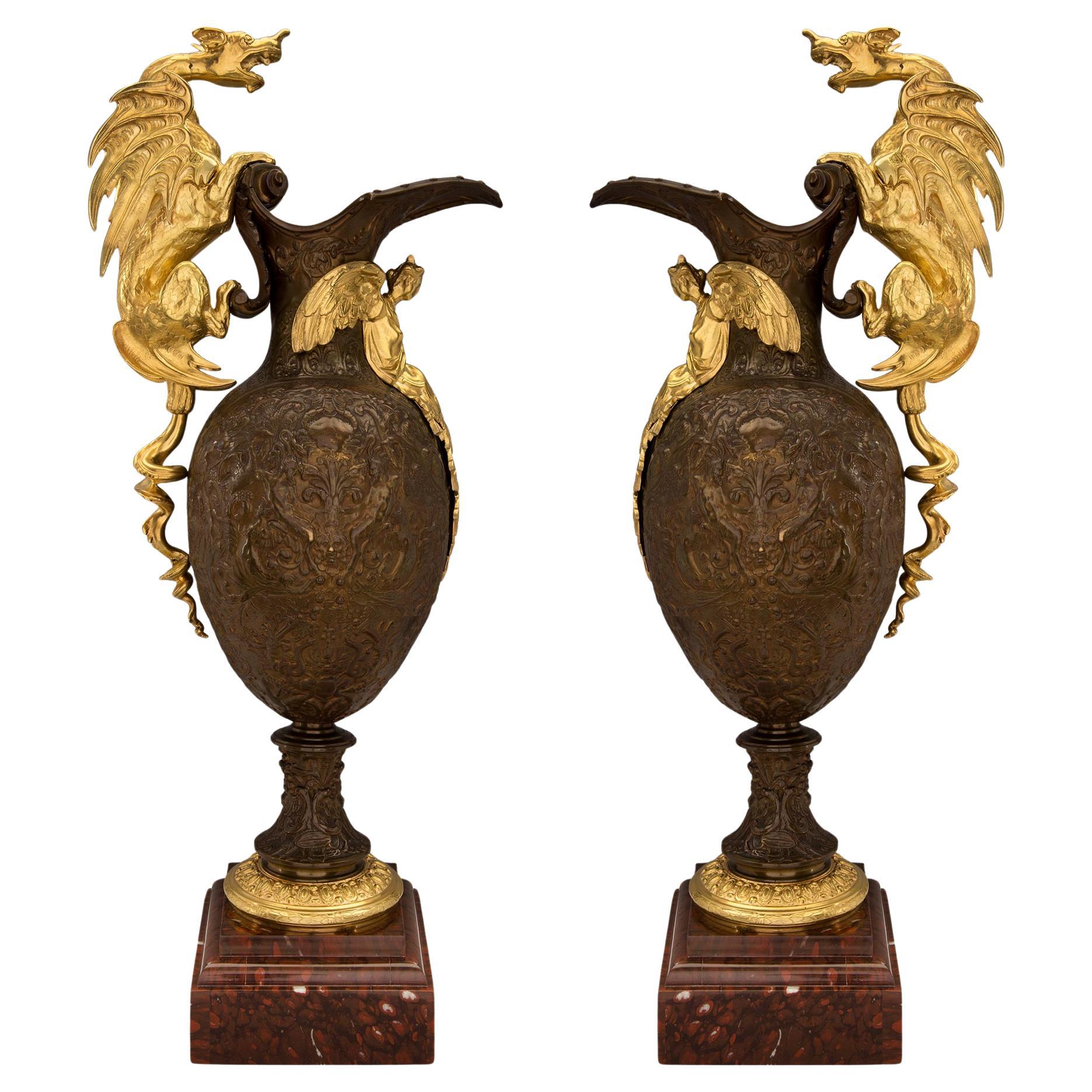 pair of French 19th Renaissance st. Ormolu, patinated Bronze and Marble ewers
