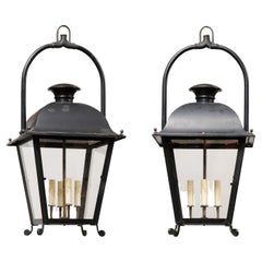 Pair of French 20th Century Black Iron Four-Light Lanterns with Glass Panels