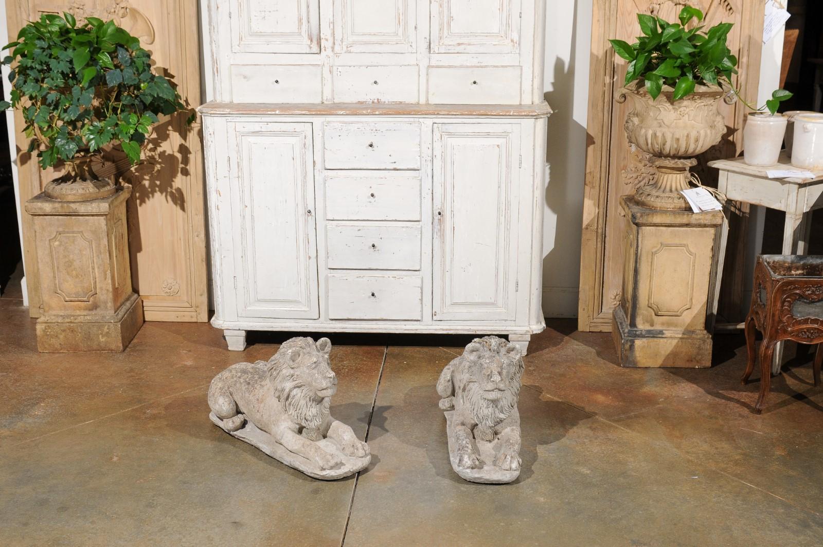 Pair of French 20th Century Cement Reclining Lion Sculptures with Patina In Good Condition In Atlanta, GA