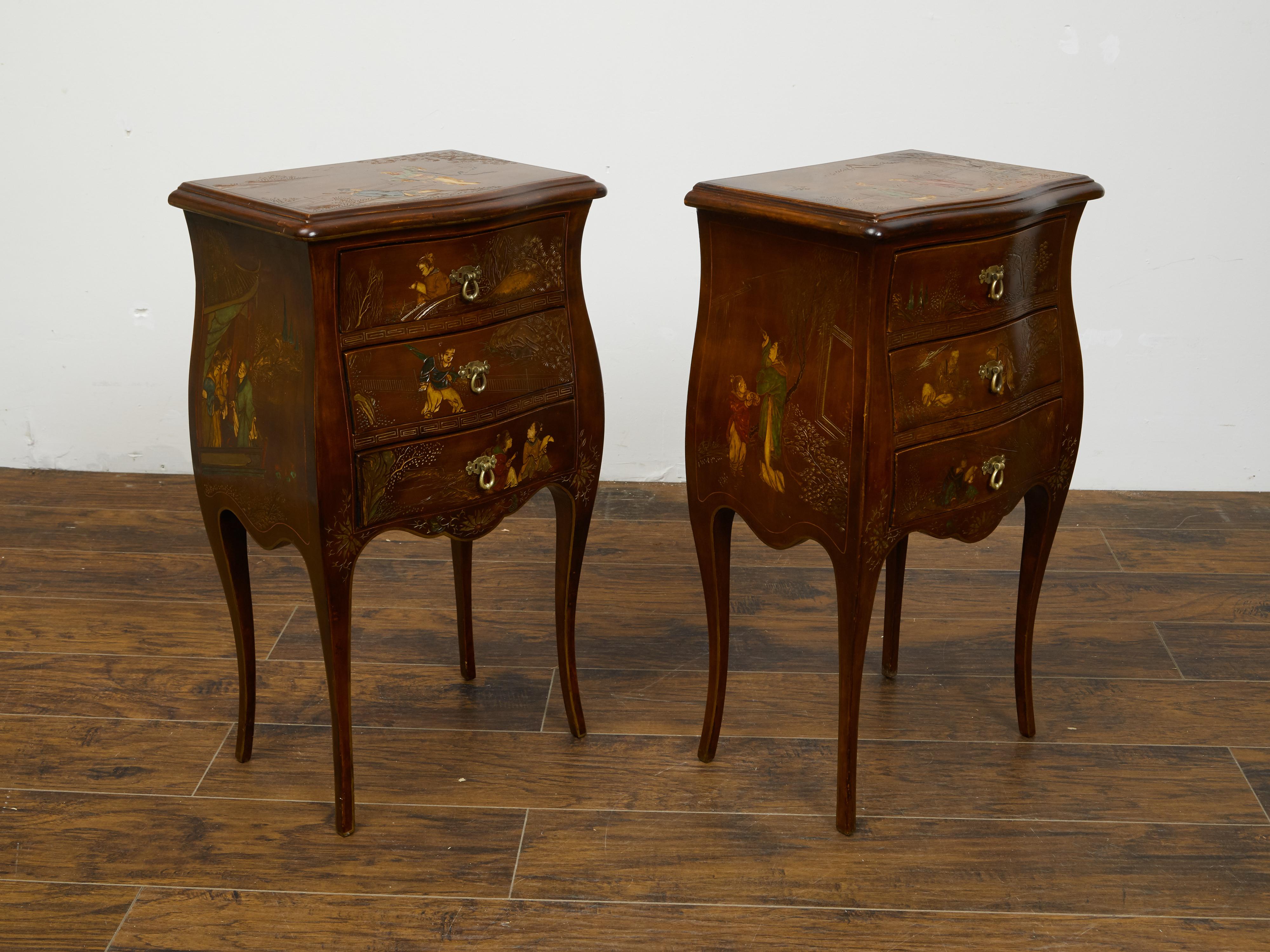 A pair of French bedside tables from the 20th century, with chinoiserie décor. Created in France during the 20th century, each of this pair of tables features a rectangular top with serpentine front, adorned with delicate chinoiserie motifs. The