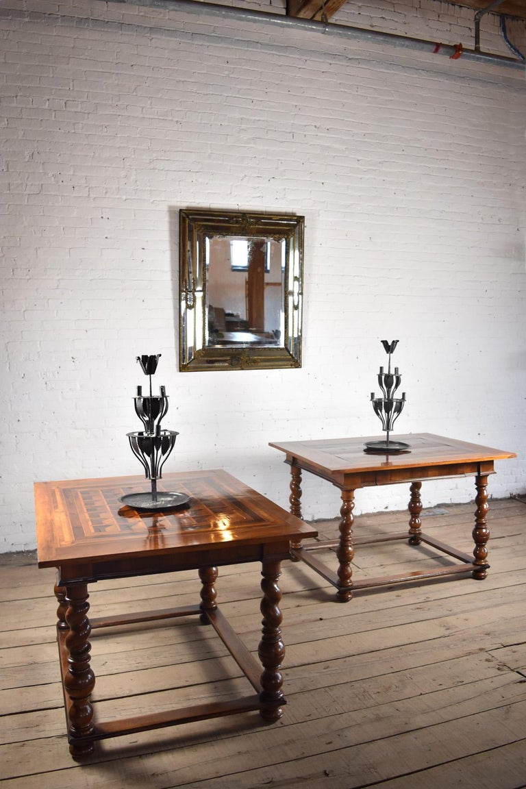 Pair of rare, unusual, early 18th century parquetry veneered center or side tables of very conceptual design, having geometrical Trompe-l'Oeil inlaid tops over a frieze containing one drawer, on turned legs connected by flat box stretchers.