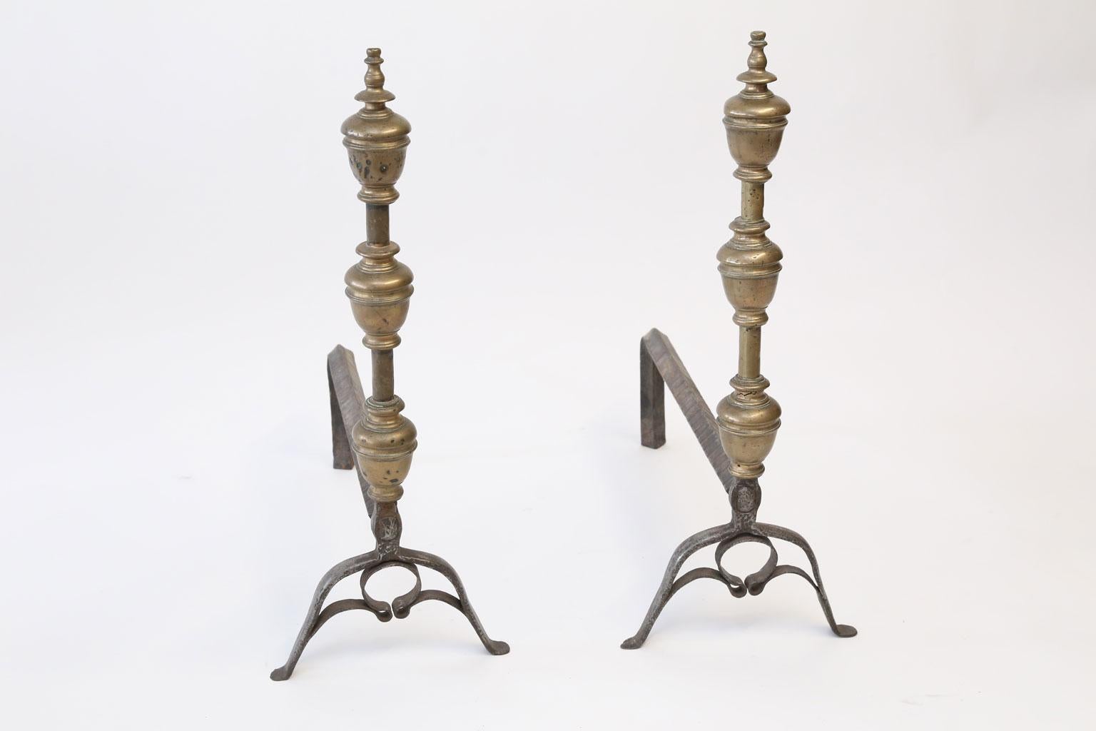 Pair of French andirons in bronze and hand forged iron dating to the late 18th century.
 