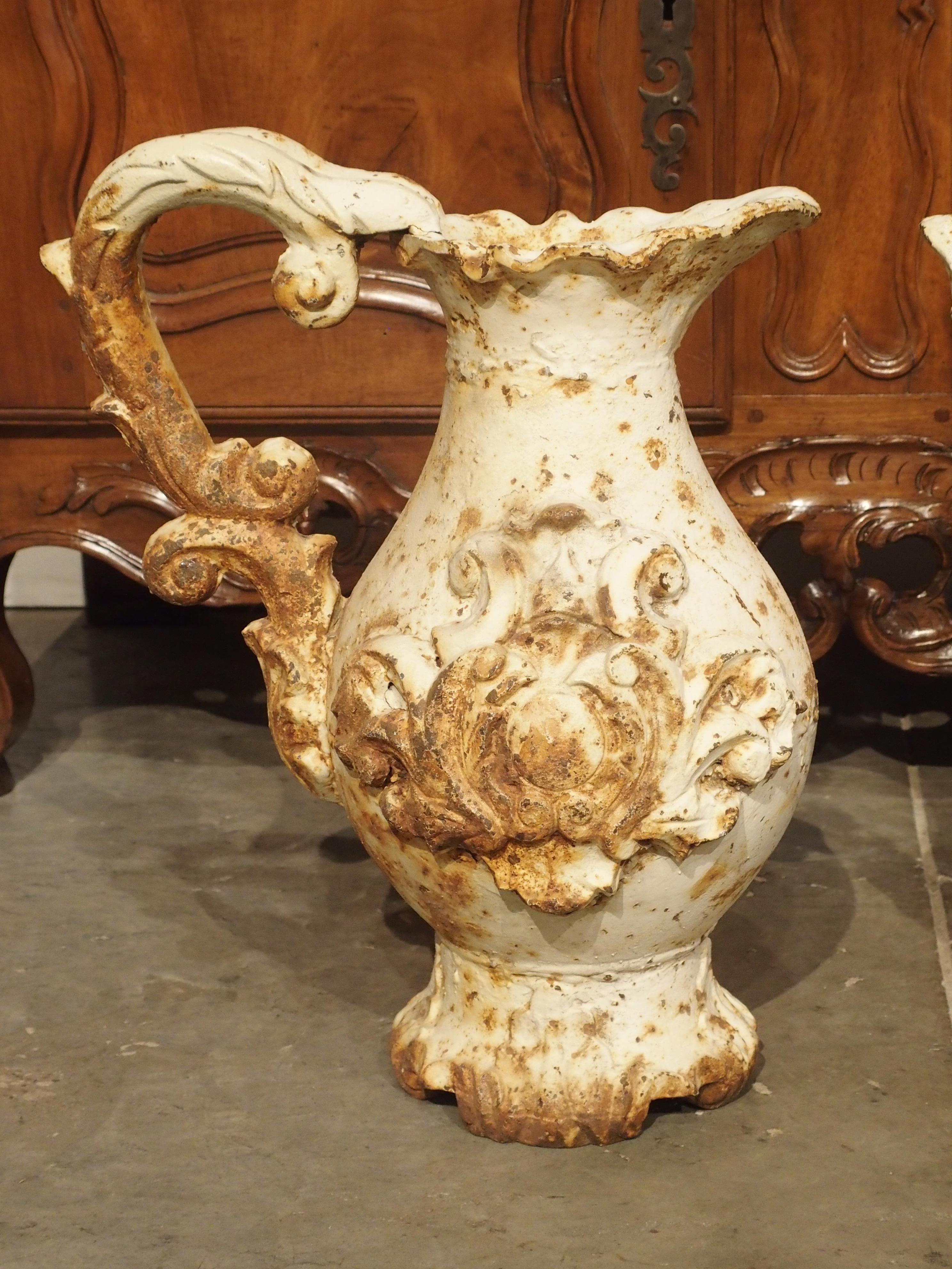 Pair of French Antique Cast Iron Pitchers 1