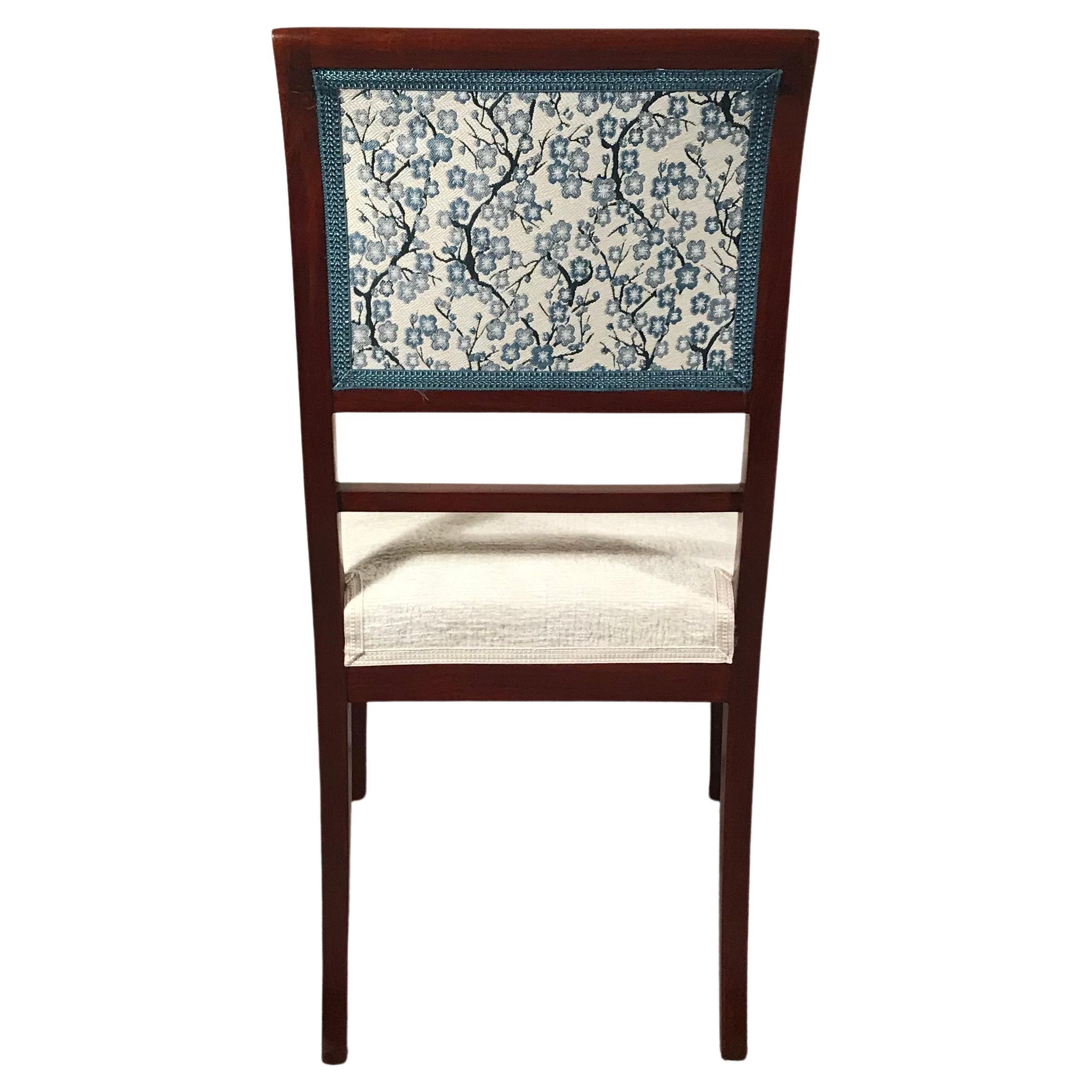 Experience the timeless allure of this exquisite pair of French side chairs, originating around 1830 during the Restauration Period. This pivotal era marked the transition from Napoleon's rule to the reign of Louis XVIII. The chairs' elegant design