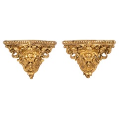 Pair of French Antique early 18th-century Carved Wooden Gilded Corner Consoles