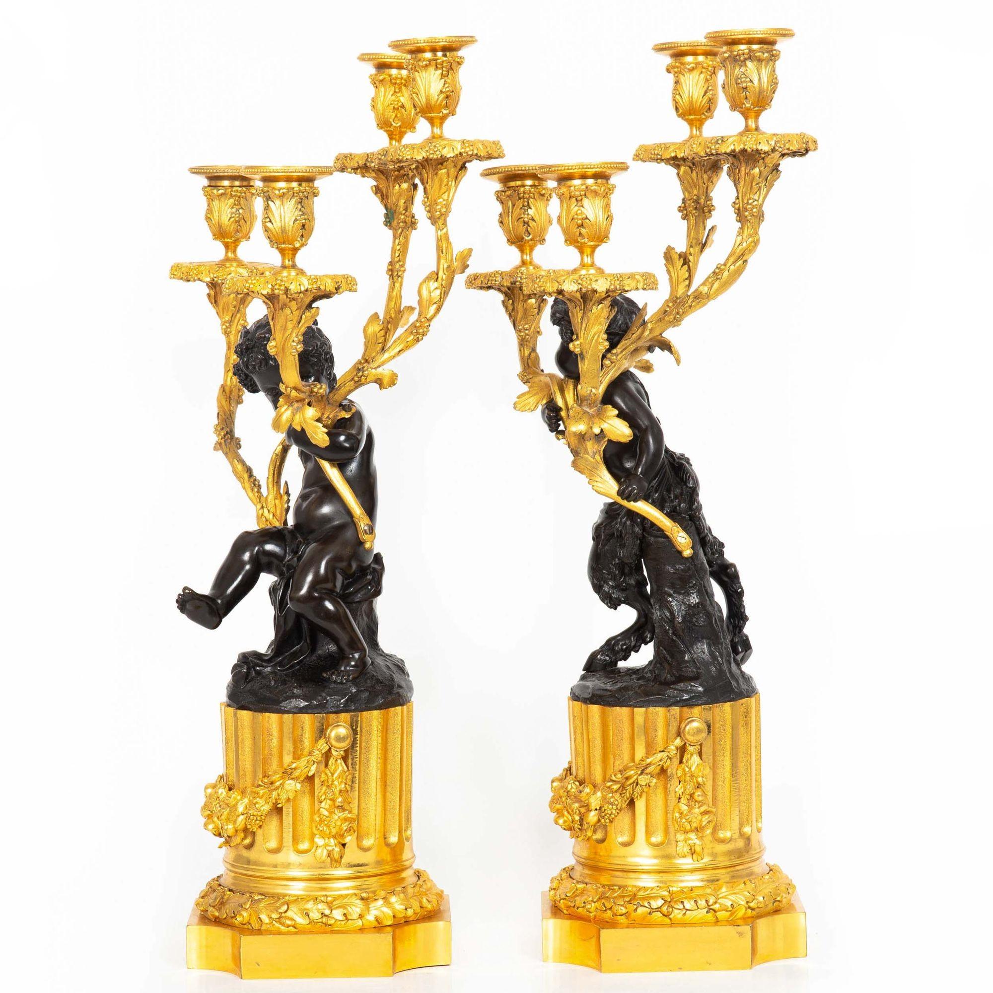 PAIR OF LOUIS XVI STYLE FOUR-LIGHT GILT AND PATINATED CANDELABRA OF YOUNG BACCHANTESSE & SATYR
After the models by Claude Michel, known as Clodion  France, circa 1870
Item # 403SAY11Z

A finely cast pair with brilliant gilding and great contrast