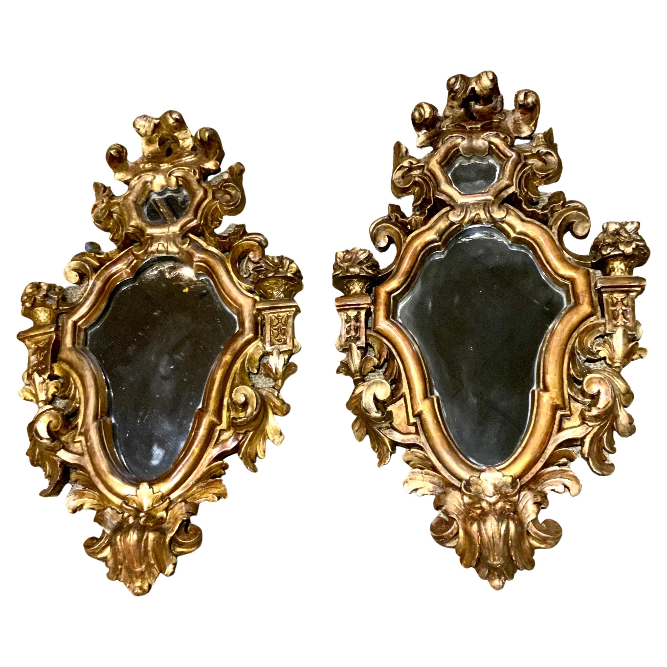 Pair of French antique giltwood mirrors 