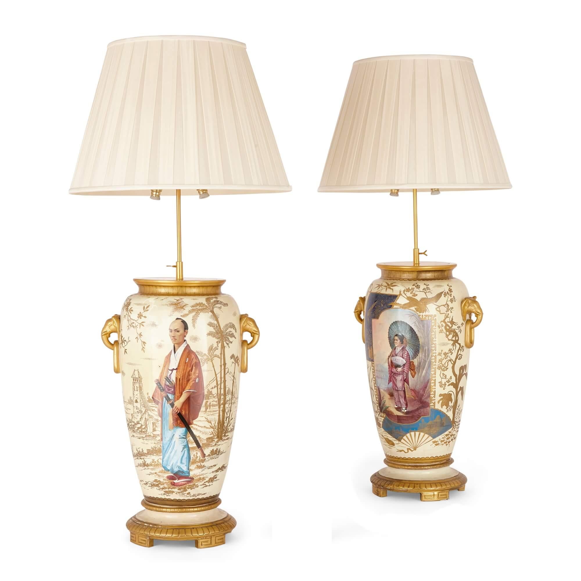 Pair of French antique Japonisme glazed ceramic and ormolu mounted lamps
French, Late 19th Century
Lamps: height 104cm, width 36cm, depth 26cm
Shades: height 33cm, diameter 50cm

In the Japonisme style, these superb, exceptionally large lamps