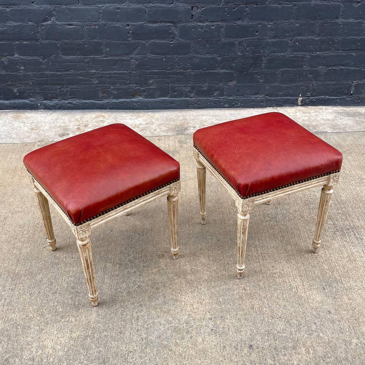 Pair of French Antique Louis XVI Style Hand Carved Stool Benches

Country: France
Materials: Distress Paint Finish, Original Leather
Style: French Antique
Year: 1920s

Dimensions 
19”H x 16”W x 16”D
