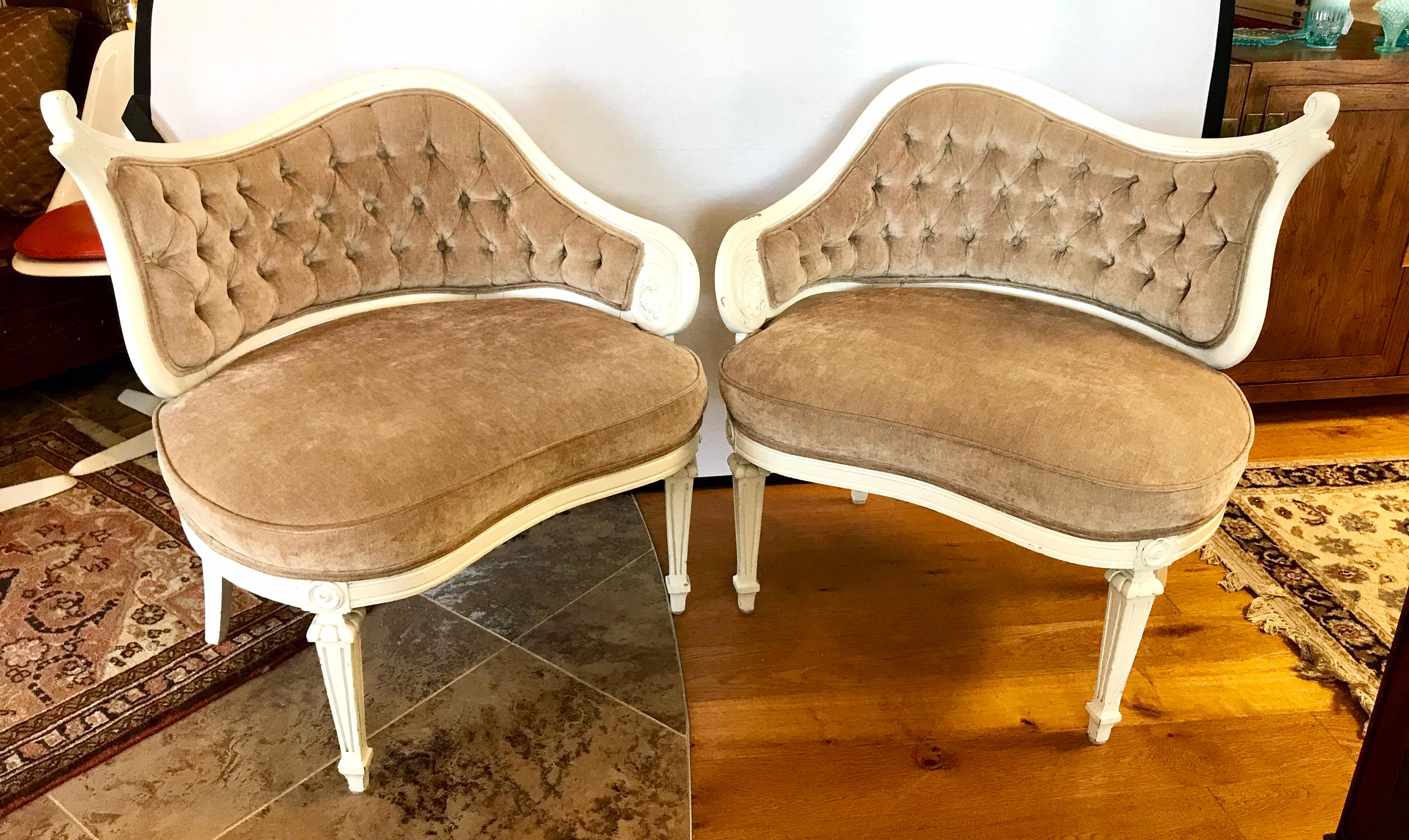 Unique, elegant tufted velvet chairs with a distressed white painted wood frame. Ultra-chic, this feminine velvet arm chair brings Parisian refinement to any room and makes for the perfect spot to curl up with a good book. This chair features a