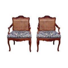 Pair of French Walnut Foliage and Shell Arm Chairs with Cane Seats C. 1820 