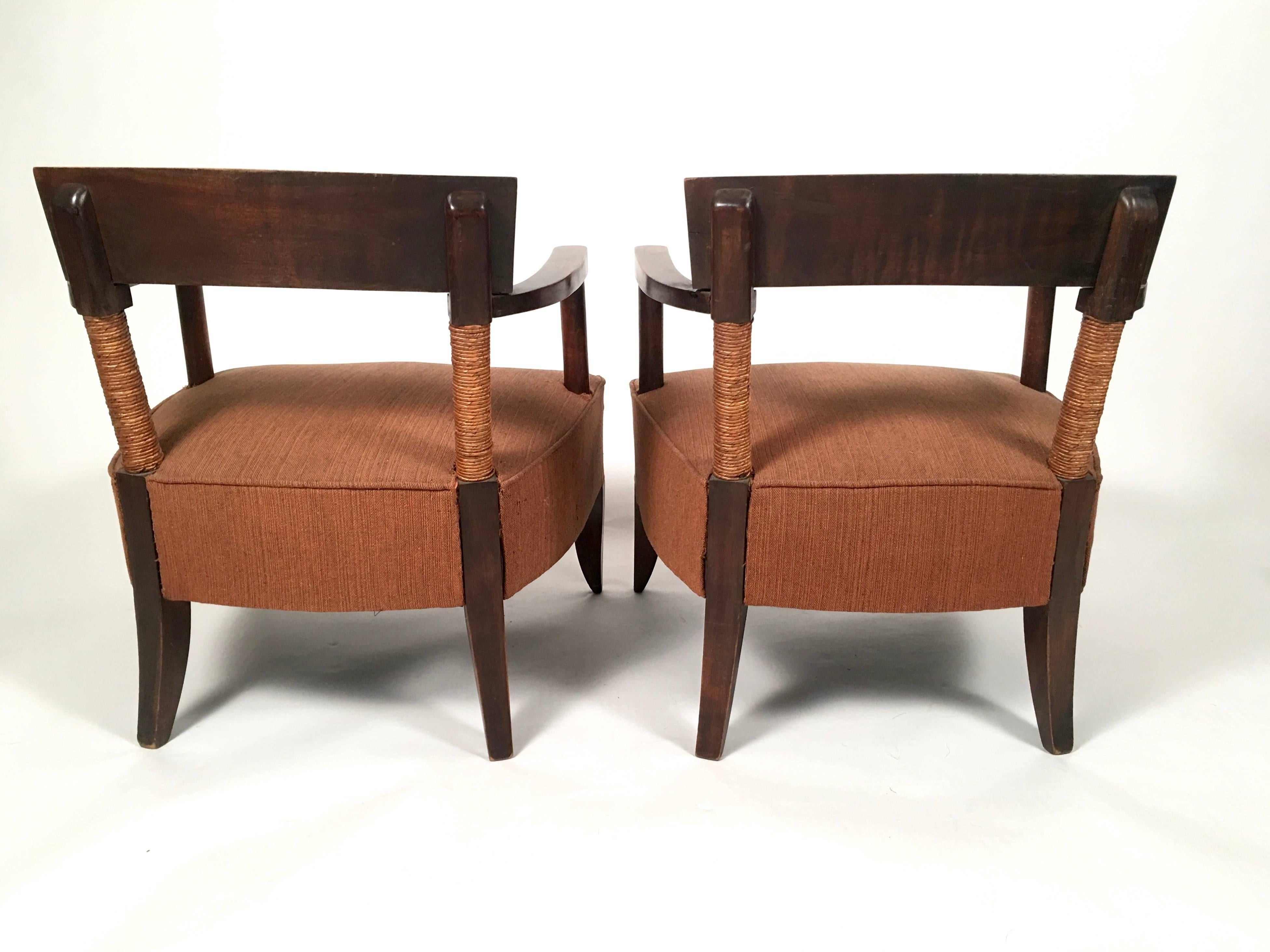 Early 20th Century Pair of French Art Deco African Inspired Oak and Paper Cord Armchairs