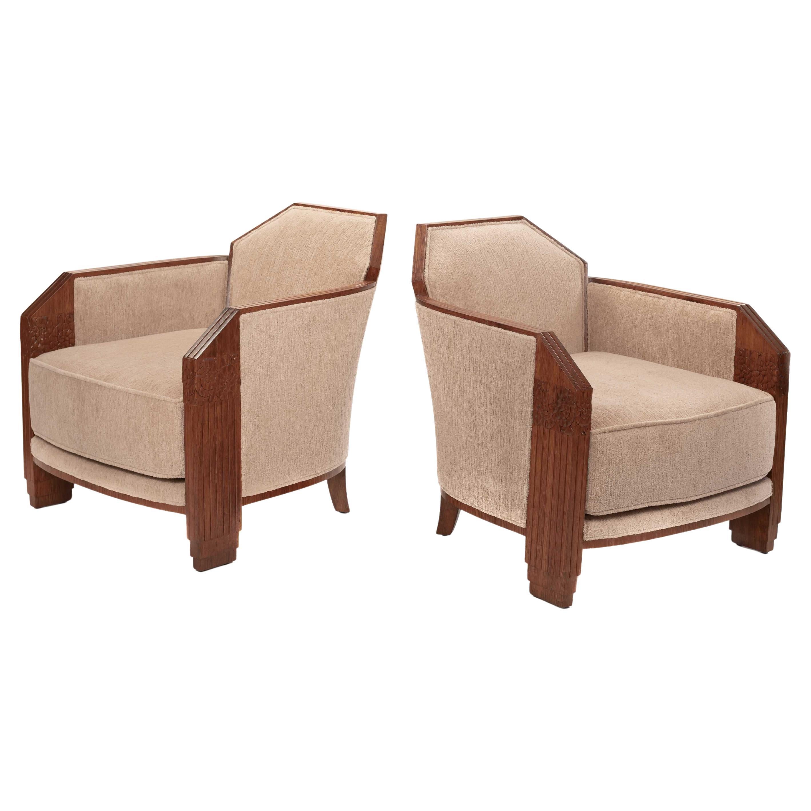 Pair of French Art Deco Armchairs in Solid Rosewood with Stylized Carvings 1920s For Sale