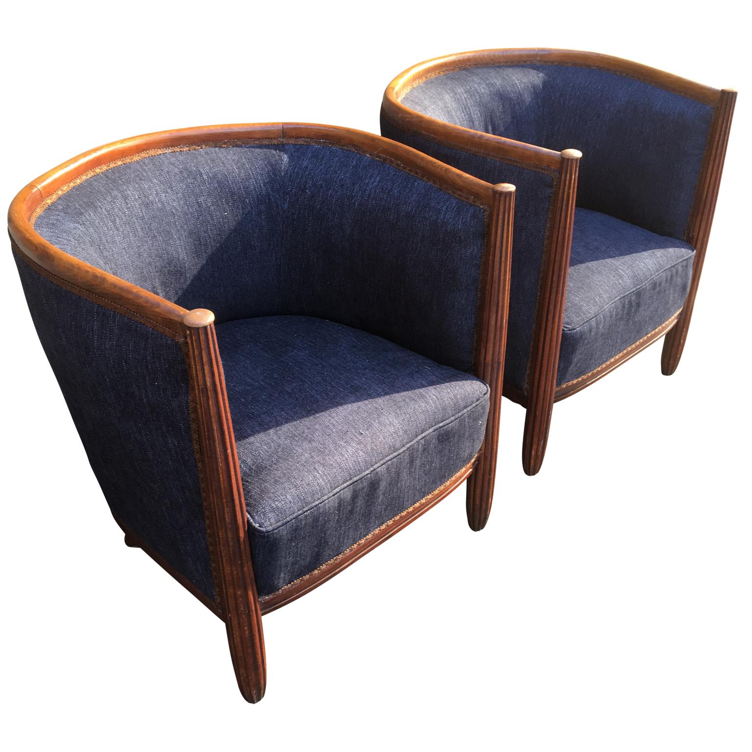 Pair of French Art Deco barrel club chairs.

