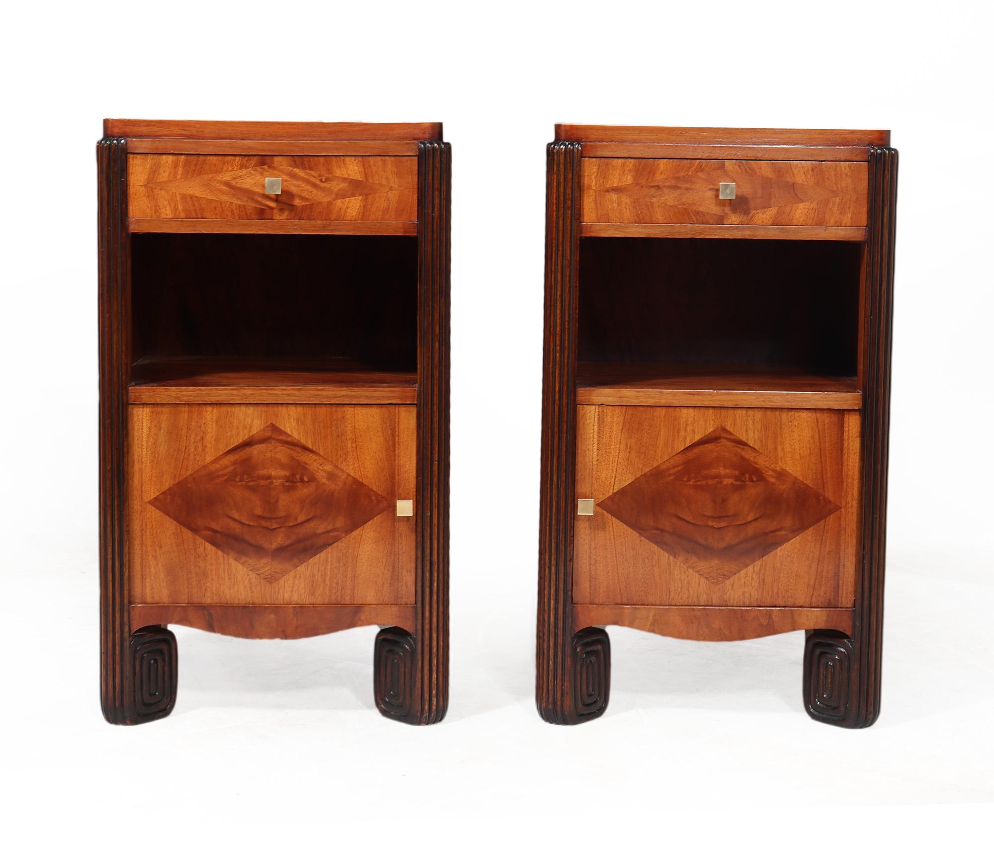 BEDSIDE CABINETS - MICHEL DUFET
An exceptional and rare pair of bedside cabinets by Michel Dufet, produced in France in c1925, in walnut on Oak, having inlayed contrasting walnut in diamond form, reeded leg uprights single drawer above open shelf