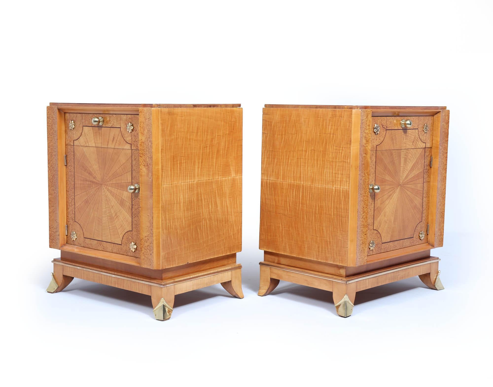 Art Deco Bedside Cabinets 
A stunning pair of Art Deco bedside cabinets, masterfully crafted in France during the 1930s. These exquisite pieces, made from karilean birch and sycamore, embody the elegance and sophistication of the Art Deco movement,