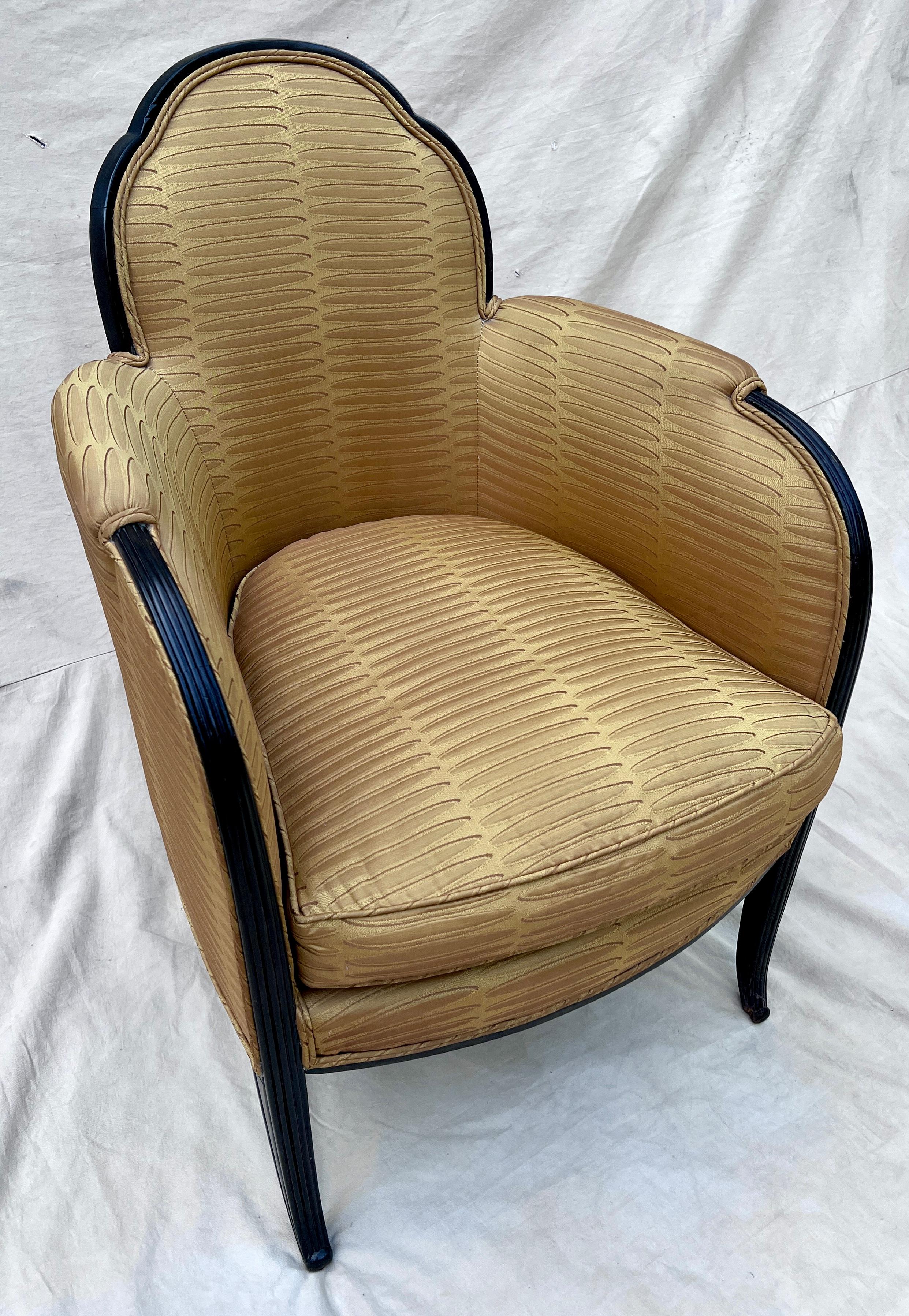 Hand-Carved Pair of French Art Deco Bergere Chairs in the Style of Paul Follot For Sale