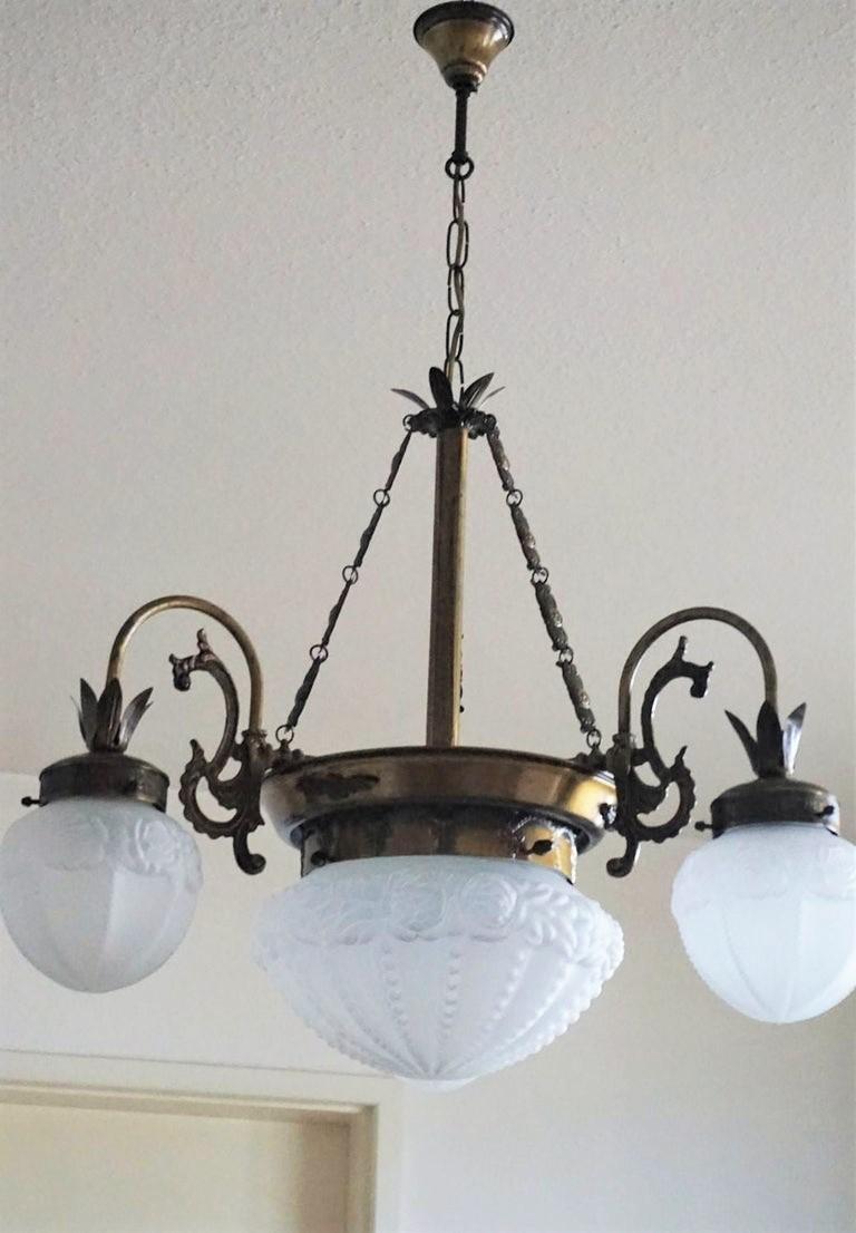 Pair of French Art Deco Brass Frosted Glass in High Relief Four-Light Chandelier In Good Condition In Frankfurt am Main, DE