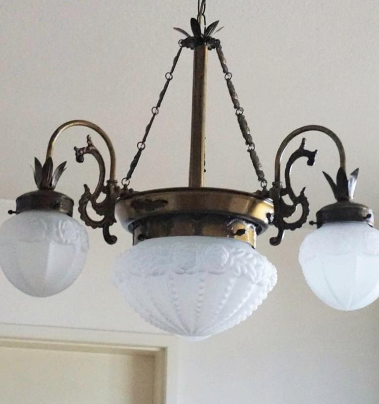 20th Century Pair of French Art Deco Brass Frosted Glass in High Relief Four-Light Chandelier