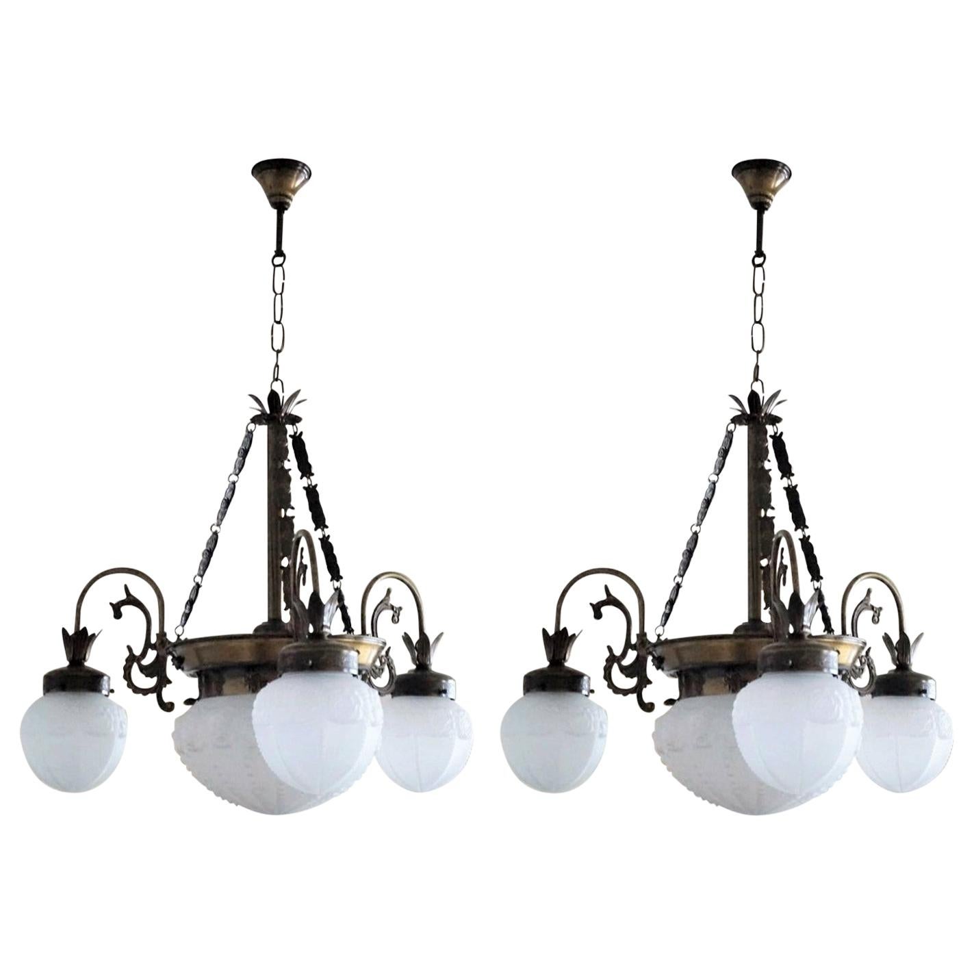 Pair of French Art Deco Brass Frosted Glass in High Relief Four-Light Chandelier