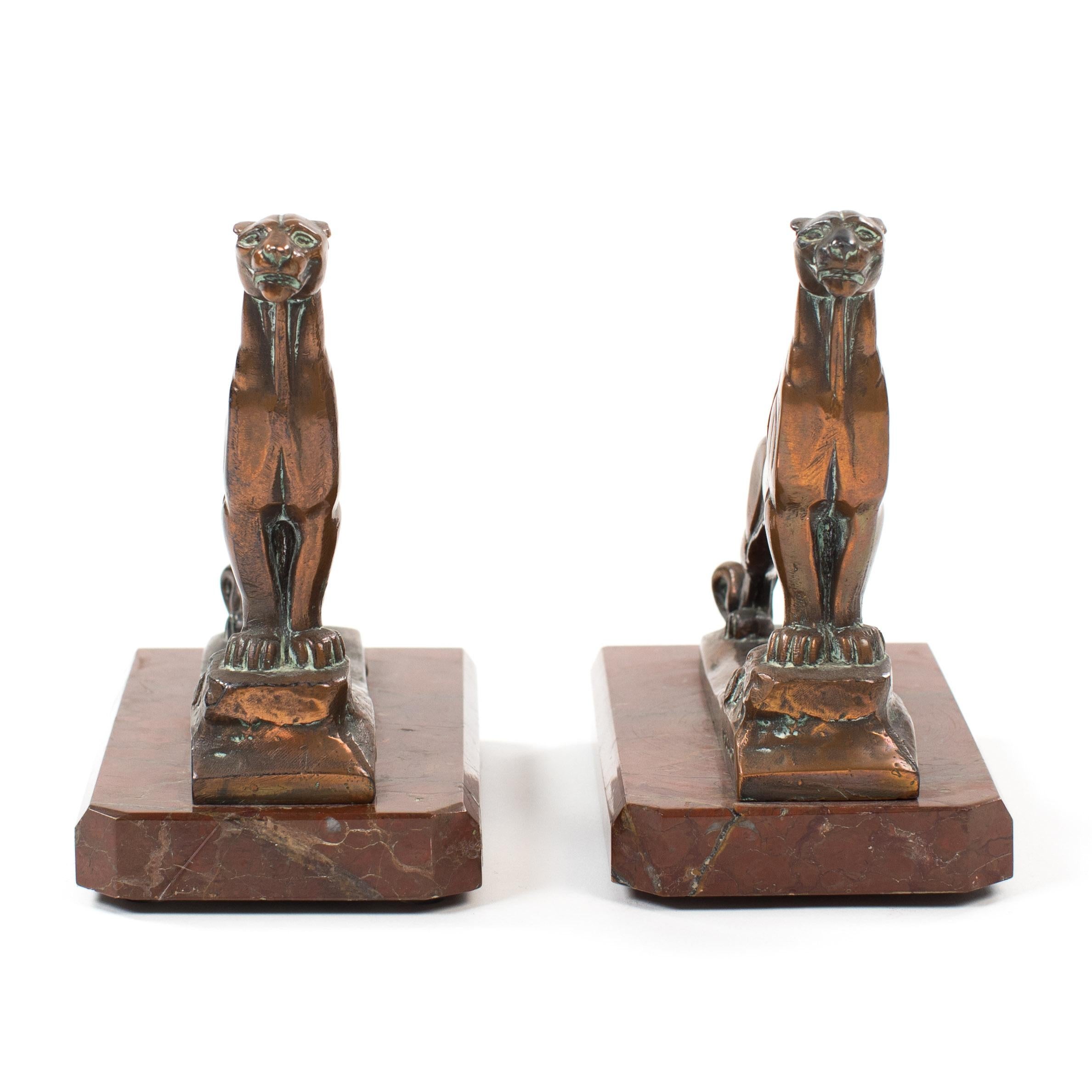 Pair of French Art Déco Bronze Panther Bookends on Marble base, signed Frecourt 

Panther bookends made of cast bronze by sculptor Maurice Frecourt. 
Frecourt, a pupil of Valton and Boucher, specialized in the depiction of animals. 
His youth and