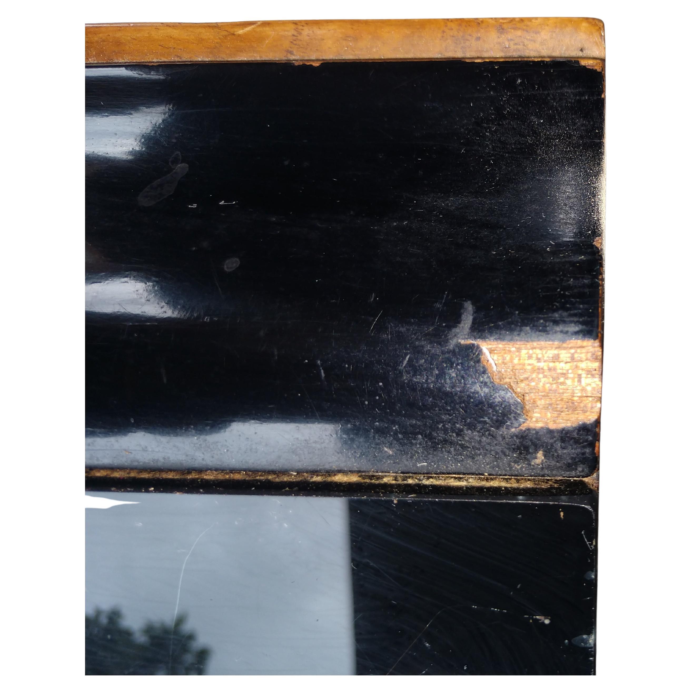 Exceptional pair of night stands created out of burl wood with ebonized tops and bases. Case is dovetailed construction with a top drawer over two doors and an open space. Lots of various storage areas. Glass tops. In original condition with some