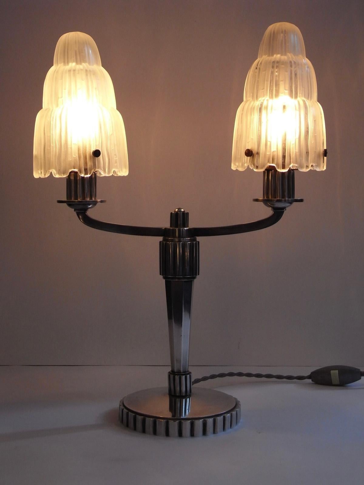 1 Pair of rare French TWO LIGHT  Art Deco table lamps by Marius Ernest Sabino. Model 
