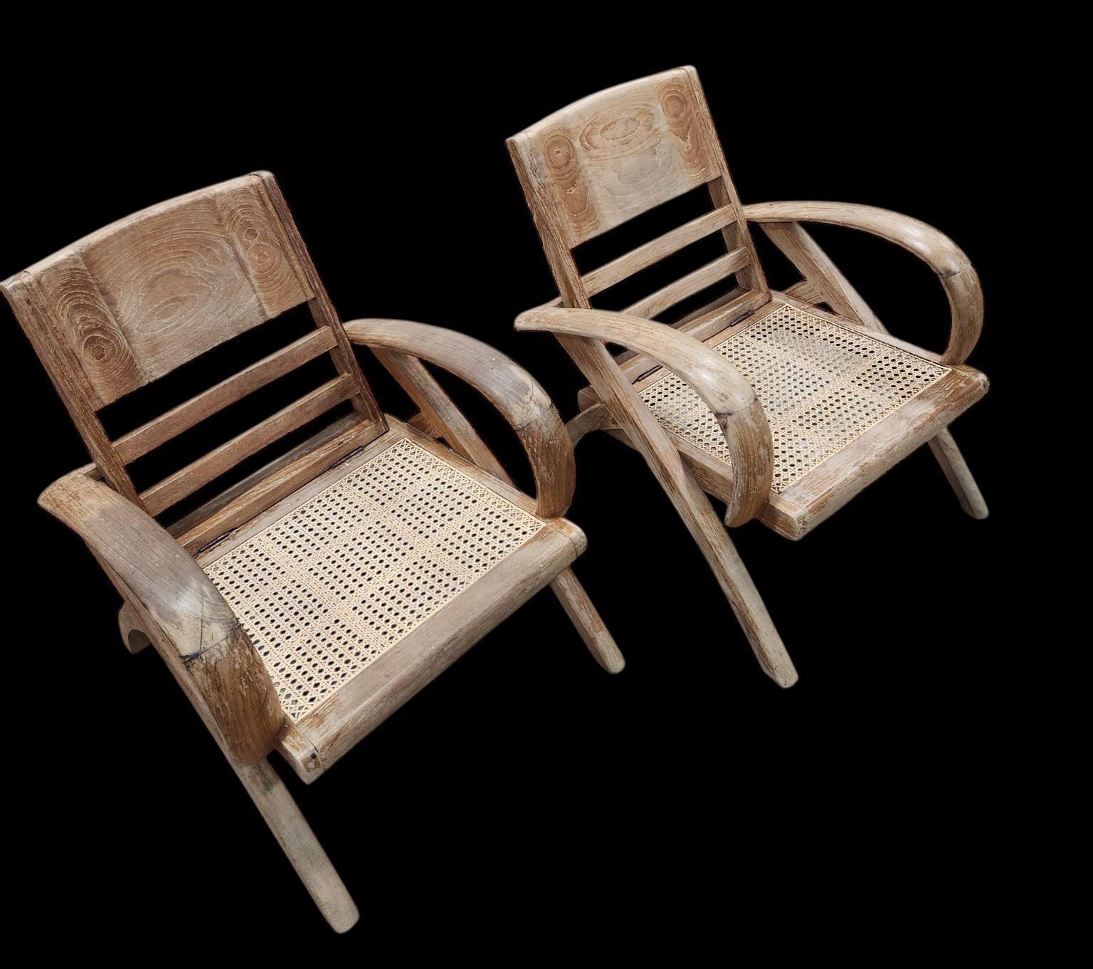 Pair of French Art Deco Cerused Oak Lounge Chairs, by Rene Gabriel (attribution), France circa 1930’s-1940’s, newly re-caned, wear to finish, structurally sound. 28 inches high, 25 inches wide, 28 inches deep, 14 inches seat height